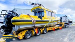 Big boat transport moving coastguard patrol boat by road interstate pjisjji9qpd48uur4xpkrurjm3g2on2e3eee00gbuo 300x169